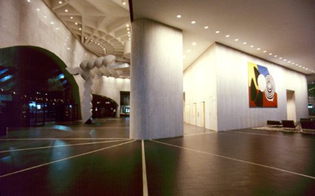 The entrance lobby with exposed structure and artworks by Carlberg and Calder