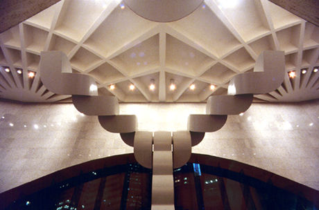Carlberg sculpture seen against exposed rib structure