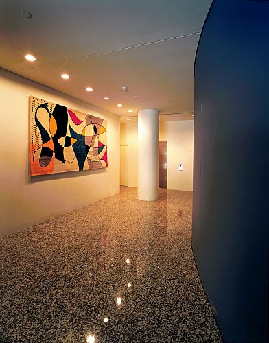 Entry lobby with woven carpet based on wall mural in Rose Seidler house, painted by the architect in 1950
