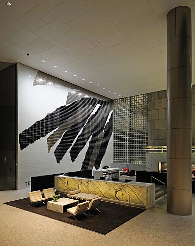 Lin Utzon mural with seating group and café tenancy