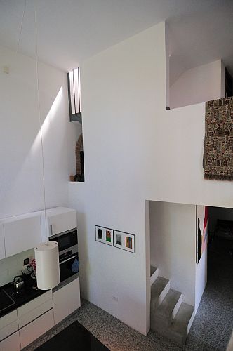 Double storey space with stair in background